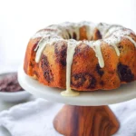 Vanilla and chocolate marbled bundt cake served on a decorative plate