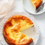 Delicious 3-ingredient yogurt cake served on a plate with fruit toppings.