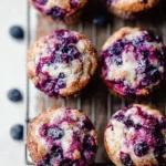 Freshly baked buttermilk blueberry muffins with plump blueberries