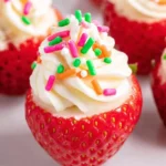 Delicious cheesecake stuffed strawberries topped with whipped cream