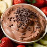 Delicious chocolate cake fruit dip served with fresh fruit for dipping