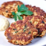 Deliciously cooked easy weeknight tuna patties served on a plate.