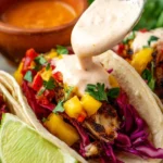 Creamy fish taco sauce served on fresh tacos