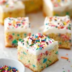 Delicious Funfetti Sheet Cake topped with colorful sprinkles and frosting