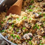Delicious Teriyaki Rice Pilaf with mushrooms and peas served in a bowl