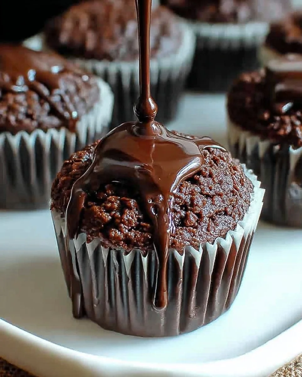 Delicious whole grain chocolate cupcakes topped with chocolate frosting