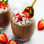 A delicious bowl of Chocolate Chia Pudding topped with fresh berries