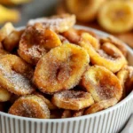 Cinnamon-sugar air fryer banana chips on a serving plate