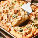 Delicious Crab Rangoon Pizza topped with crab, cream cheese, and crispy wonton chips.