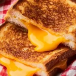 Delicious Disneyland grilled cheese copycat recipe with melted cheese and crusty bread.