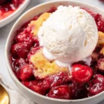 Delicious homemade easy cherry cobbler served in a dish