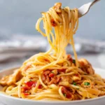 Garlic Chicken Pasta with Prosciutto served in a bowl