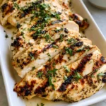 Delicious Greek yogurt marinated chicken recipe with herbs and spices.