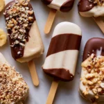 Healthy banana popsicles made from ripe bananas and yogurt, ideal for a refreshing snack.