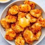 Homemade air fryer crispy chicken nuggets served on a plate