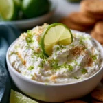 Delicious Key Lime Pie Dip served with graham crackers and lime slices