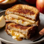 Apple Grilled Cheese Sandwich with melted cheese and sliced apples