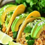 Delicious avocado turkey tacos on a plate with fresh toppings