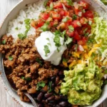 Delicious beef burrito bowls topped with fresh ingredients