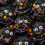 Delicious freshly baked Black Cocoa Halloween Rolls in festive shapes