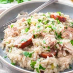 Delicious Chicken Bog served in a bowl with savory rice, chicken, and herbs.