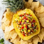 Bowl of easy homemade pineapple salsa with fresh ingredients
