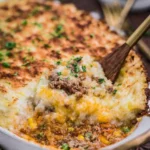 A serving of easy Shepherd's Pie with mashed potatoes on top and a savory filling