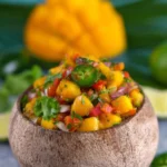 Bowl of fresh Mango Jalapeño Salsa with vibrant colors and ingredients.