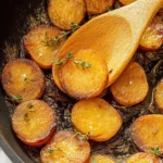 Golden brown pan fried potatoes served as a delicious side dish