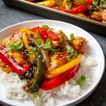 Sheet Pan Teriyaki Chicken with colorful peppers on a baking tray