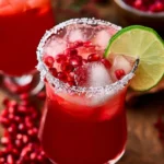 A refreshing Winter Margarita served in a glass with festive garnishes.