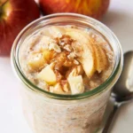 Bowl of delicious Apple Cinnamon Overnight Oats topped with fresh apples and cinnamon