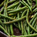Delicious roasted garlic green beans on a serving platter