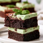 Delicious mint brownies topped with chocolate ganache and mint frosting
